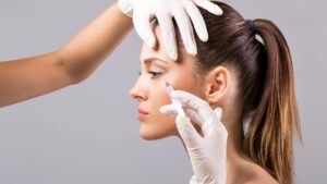 A medical professional administering a precise anti-wrinkle injection to smooth fine lines around a patient's eyes. botox in thornhill