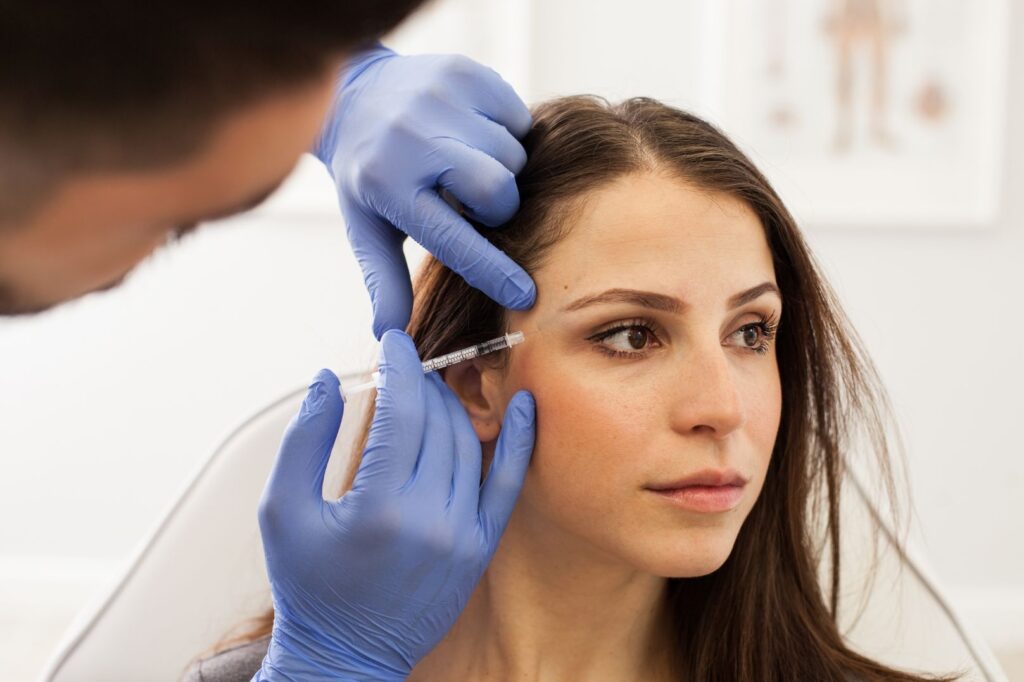 Medical professional administering a precise Botox injection at Clara Medical Spa in Thornhill